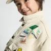 Kinderjacke Snopdog – 20 Jahre Artikelnummer: KSNOP16A20H26